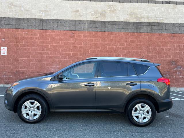 used 2015 Toyota RAV4 car, priced at $13,999