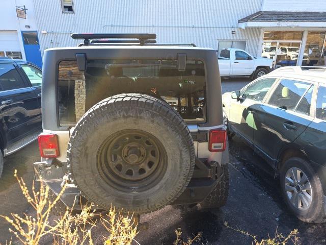 used 2015 Jeep Wrangler Unlimited car, priced at $17,427