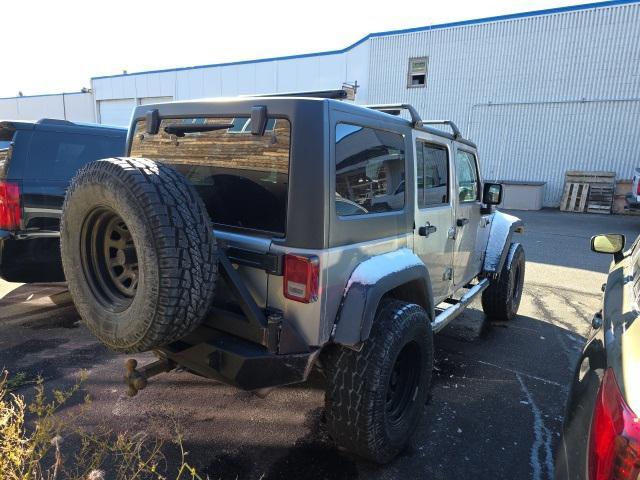 used 2015 Jeep Wrangler Unlimited car, priced at $17,427