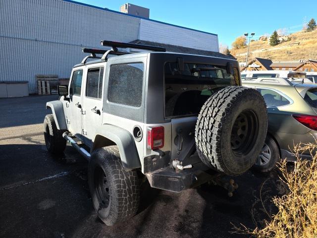 used 2015 Jeep Wrangler Unlimited car, priced at $17,427
