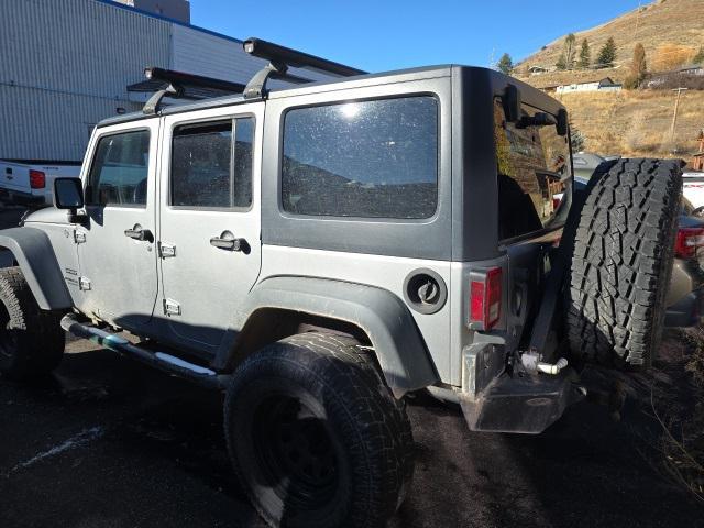 used 2015 Jeep Wrangler Unlimited car, priced at $17,427