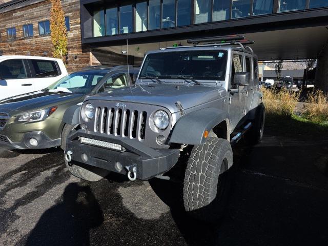used 2015 Jeep Wrangler Unlimited car, priced at $17,427
