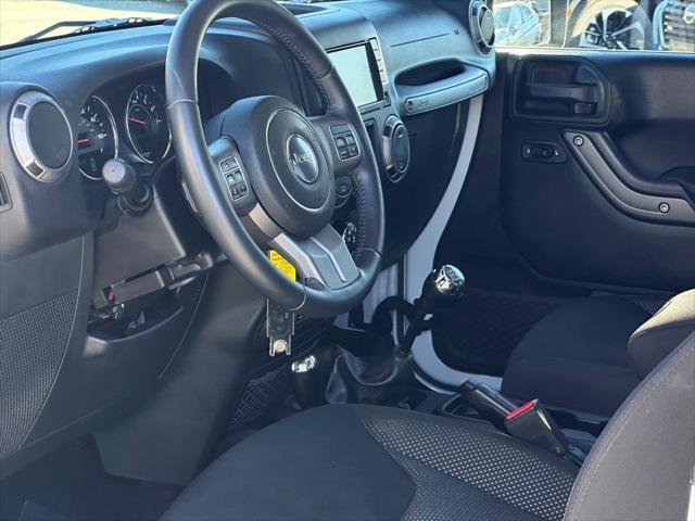 used 2016 Jeep Wrangler car, priced at $24,451