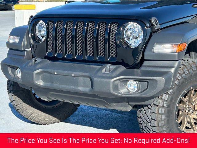 used 2023 Jeep Wrangler car, priced at $36,488