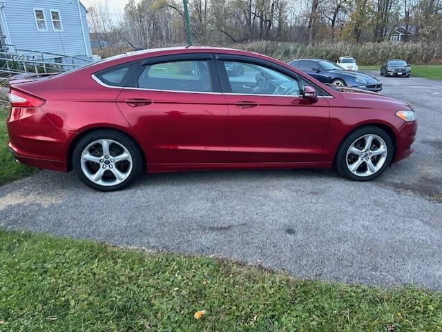 used 2013 Ford Fusion car, priced at $7,995