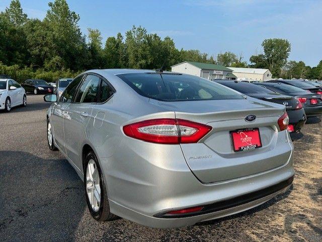 used 2016 Ford Fusion car, priced at $7,995