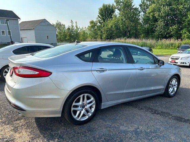 used 2016 Ford Fusion car, priced at $7,995