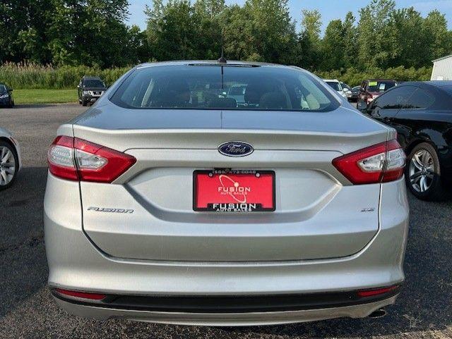 used 2016 Ford Fusion car, priced at $7,995