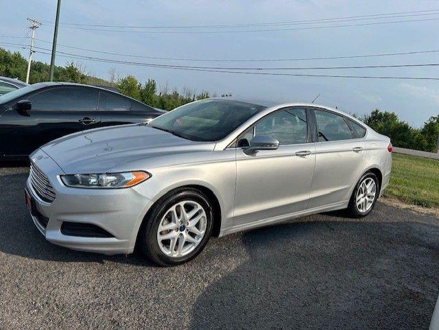 used 2016 Ford Fusion car, priced at $7,995