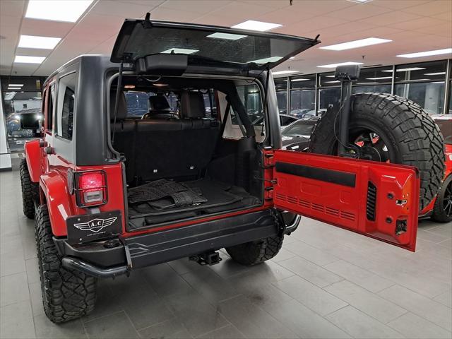 used 2014 Jeep Wrangler Unlimited car, priced at $21,549