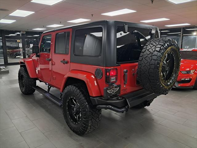 used 2014 Jeep Wrangler Unlimited car, priced at $21,549