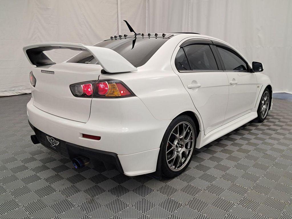 used 2013 Mitsubishi Lancer Evolution car, priced at $27,474