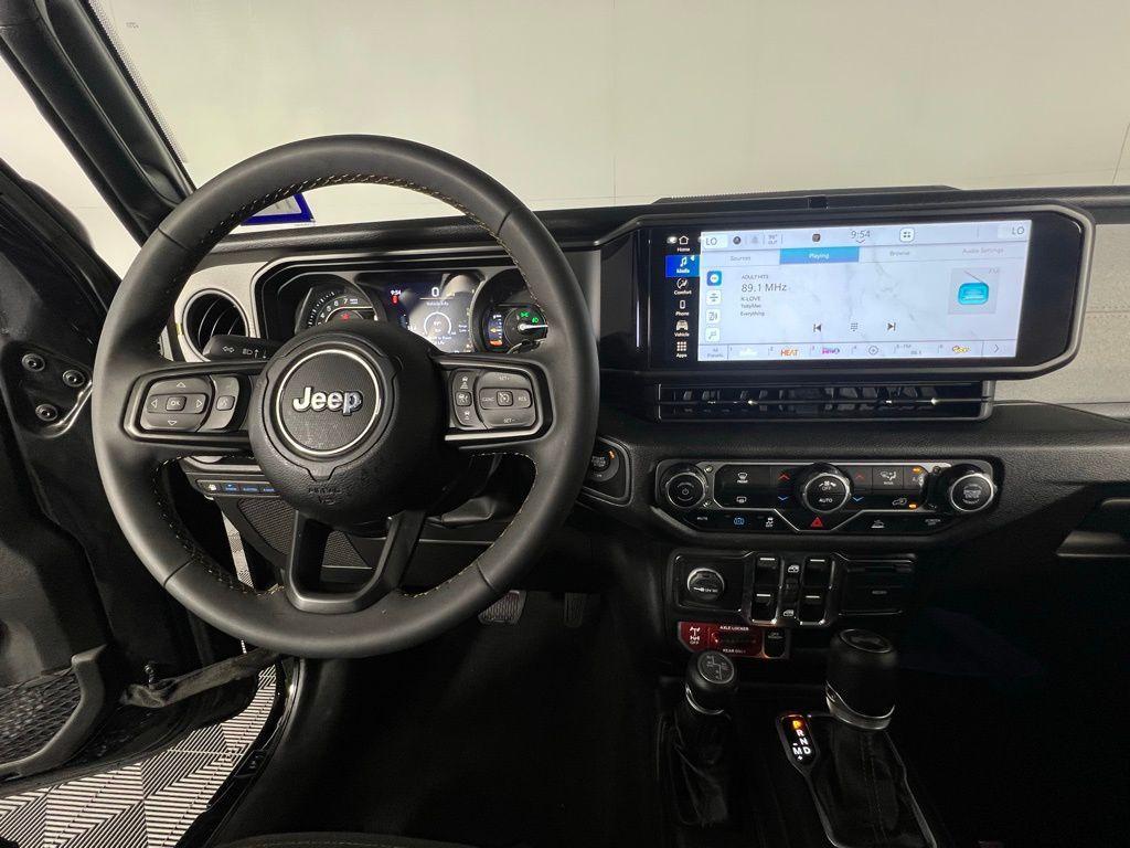 used 2024 Jeep Wrangler 4xe car, priced at $35,573