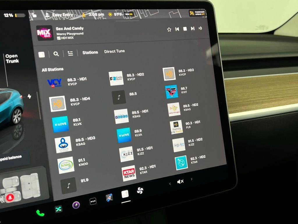 used 2024 Tesla Model Y car, priced at $32,973