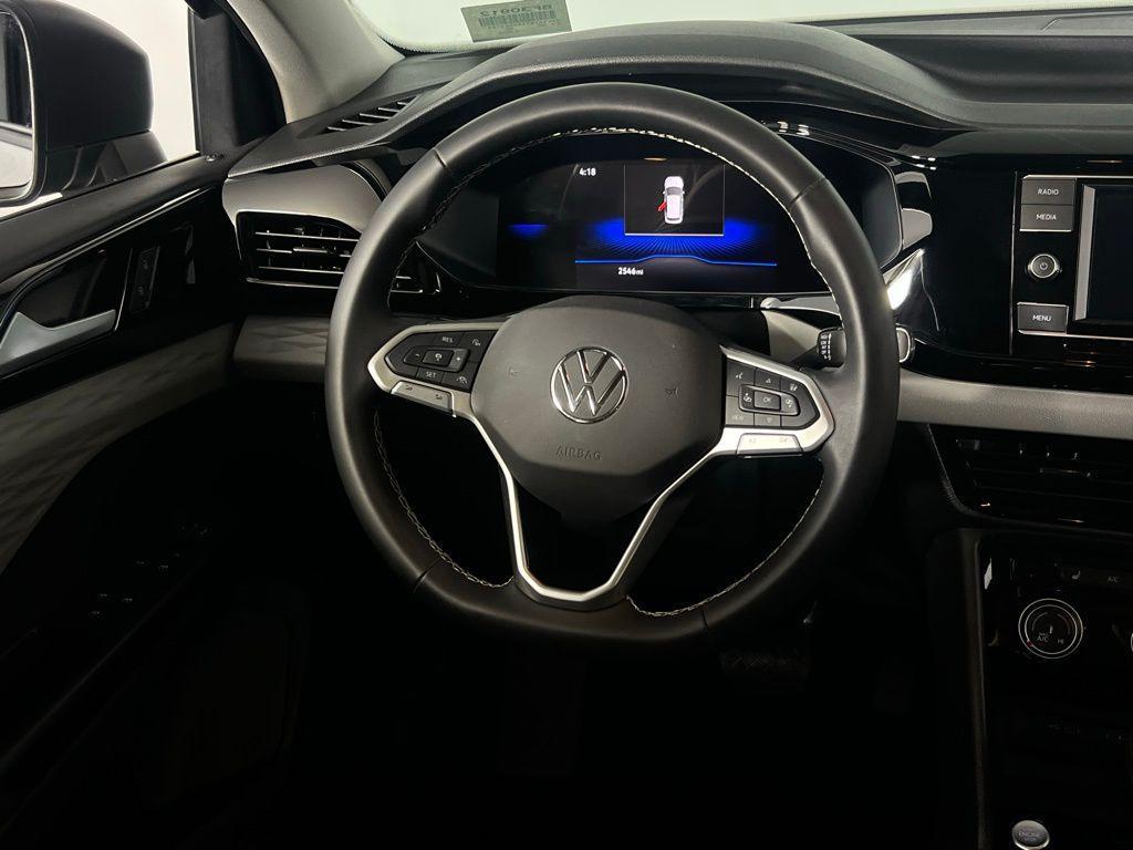 used 2024 Volkswagen Taos car, priced at $18,875