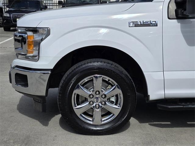 used 2019 Ford F-150 car, priced at $18,214
