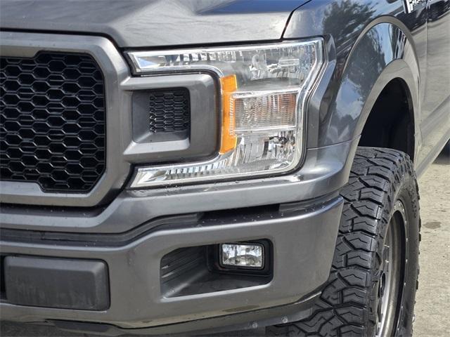 used 2018 Ford F-150 car, priced at $19,498