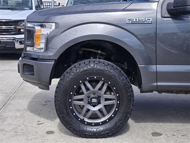 used 2018 Ford F-150 car, priced at $19,498