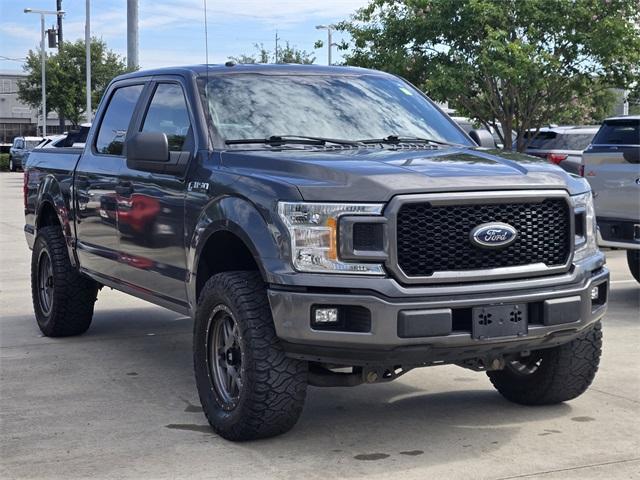 used 2018 Ford F-150 car, priced at $19,498