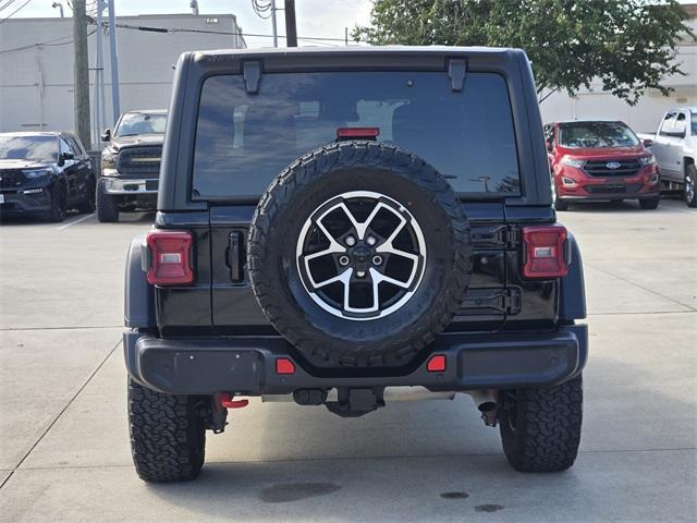 used 2024 Jeep Wrangler car, priced at $44,118