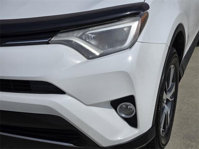 used 2018 Toyota RAV4 car, priced at $14,998