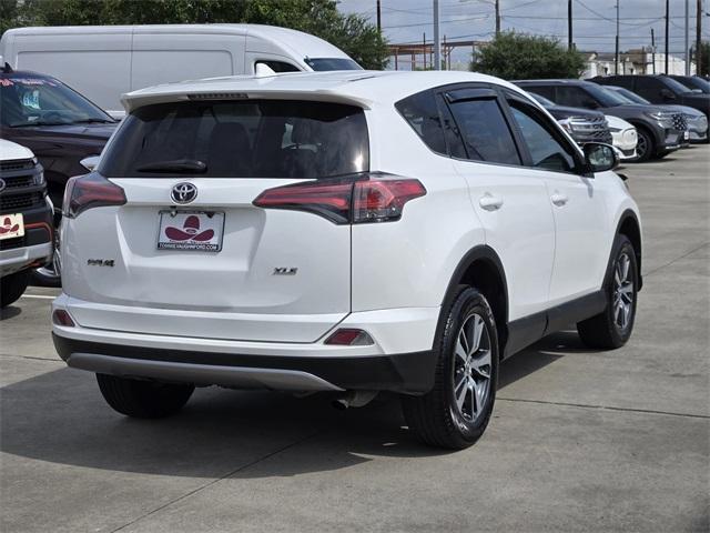 used 2018 Toyota RAV4 car, priced at $14,998