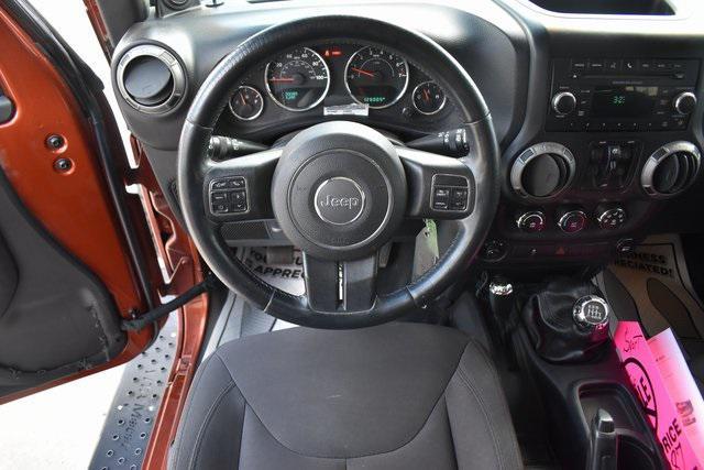 used 2014 Jeep Wrangler Unlimited car, priced at $15,987