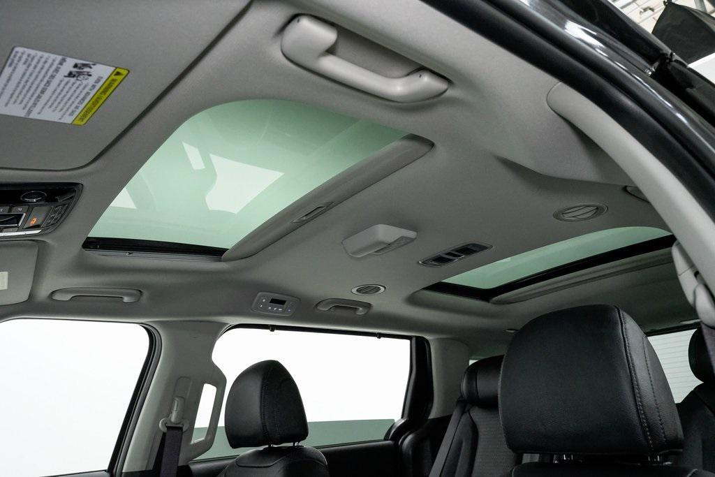 used 2025 Kia Carnival Hybrid car, priced at $46,912