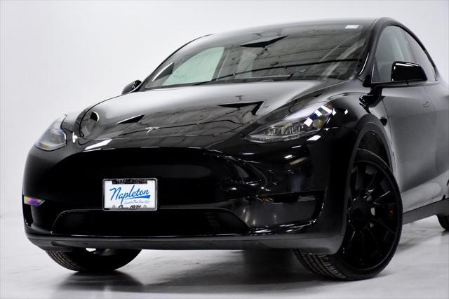 used 2024 Tesla Model Y car, priced at $32,495