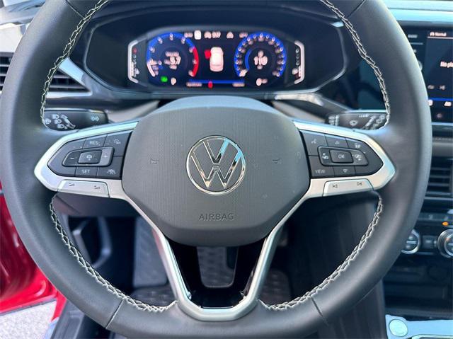 used 2024 Volkswagen Taos car, priced at $29,688