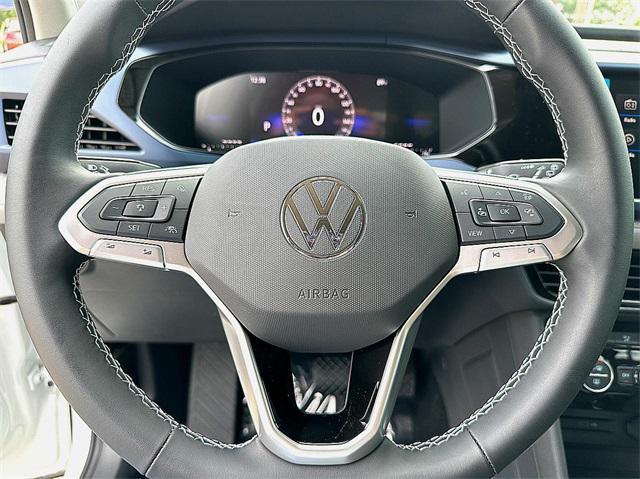 new 2024 Volkswagen Taos car, priced at $28,610