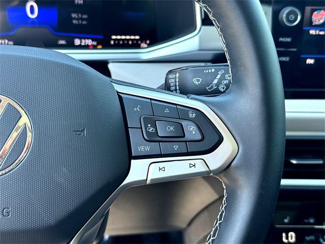 used 2025 Volkswagen Taos car, priced at $25,997