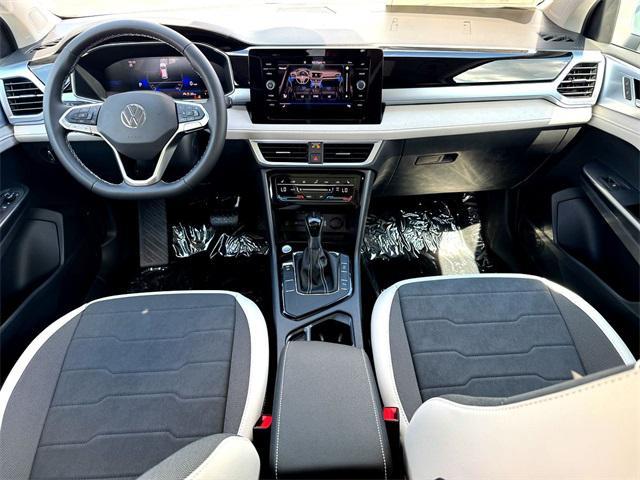 new 2025 Volkswagen Taos car, priced at $29,380