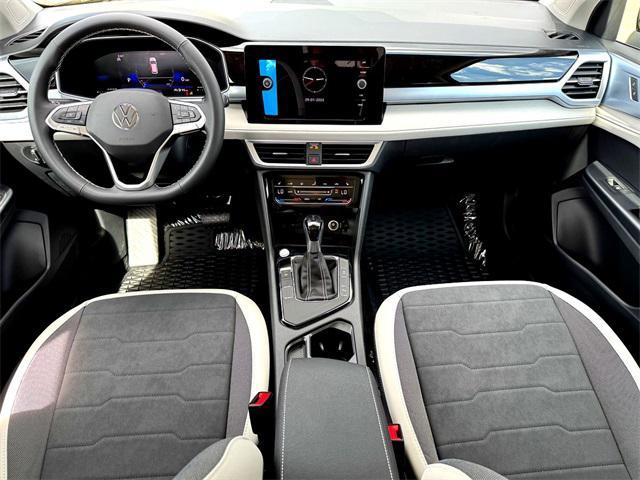 new 2025 Volkswagen Taos car, priced at $29,217