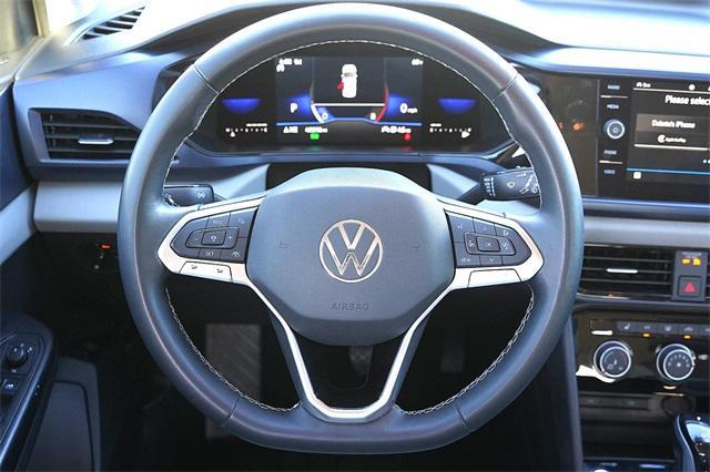 used 2023 Volkswagen Taos car, priced at $22,991