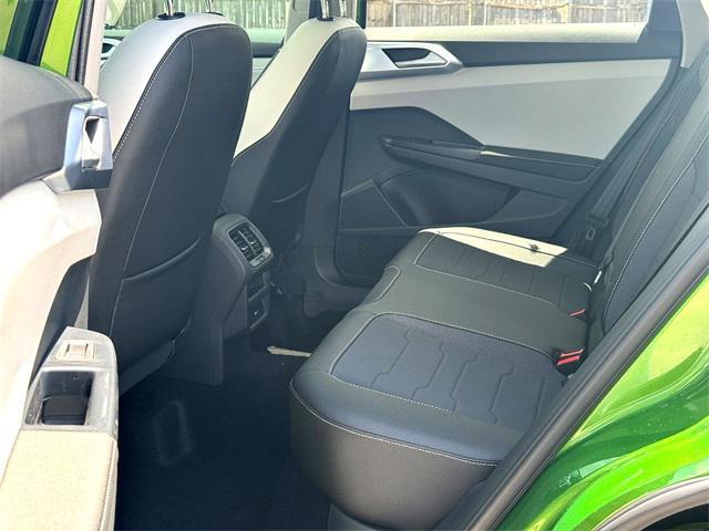 new 2025 Volkswagen Taos car, priced at $27,997