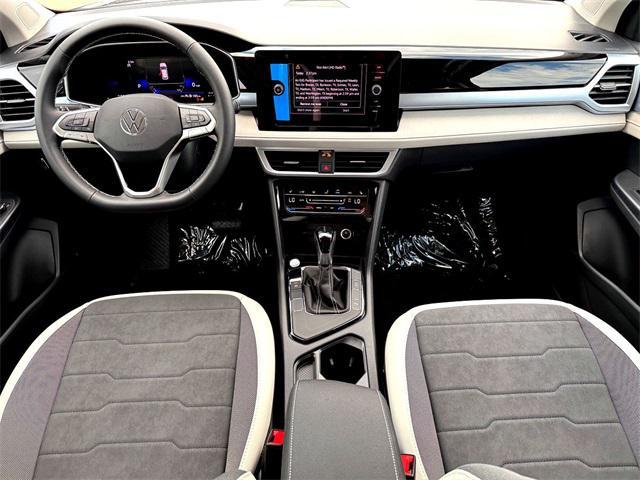 new 2025 Volkswagen Taos car, priced at $29,217