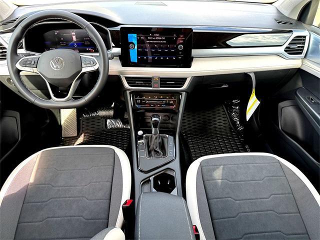new 2025 Volkswagen Taos car, priced at $29,314