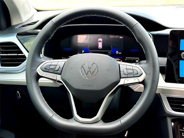 new 2025 Volkswagen Taos car, priced at $28,251