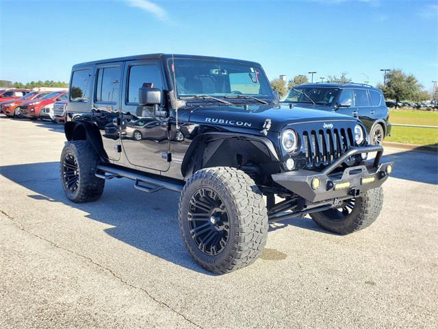 used 2016 Jeep Wrangler Unlimited car, priced at $25,991