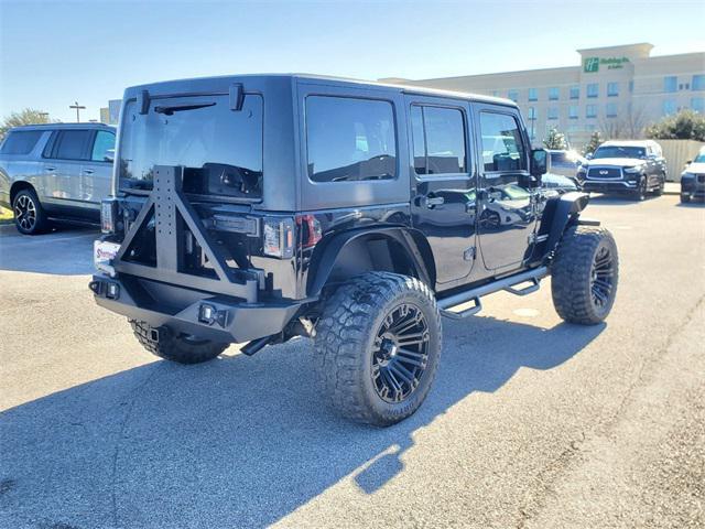 used 2016 Jeep Wrangler Unlimited car, priced at $25,991