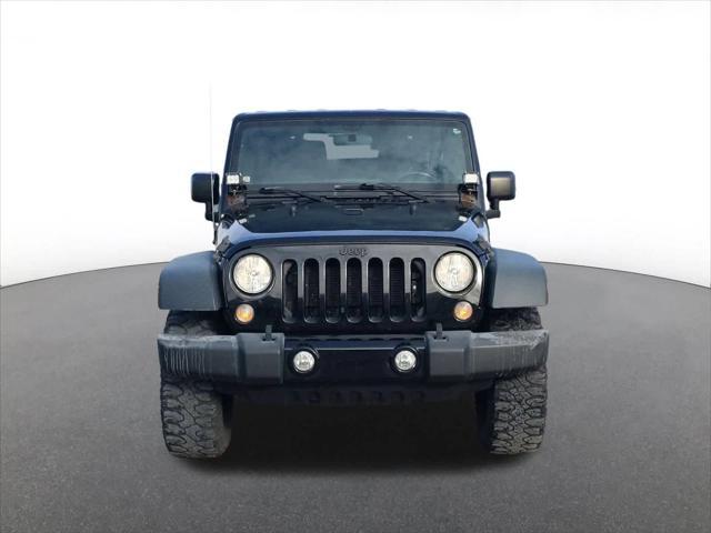 used 2014 Jeep Wrangler car, priced at $14,000