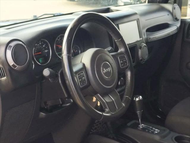 used 2014 Jeep Wrangler car, priced at $14,000