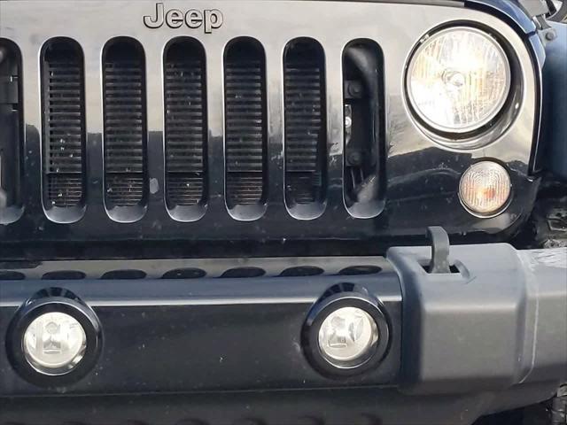 used 2014 Jeep Wrangler car, priced at $14,000