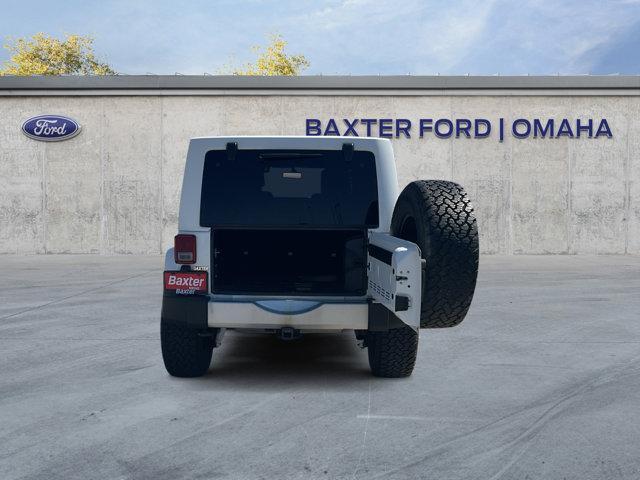 used 2014 Jeep Wrangler Unlimited car, priced at $17,388