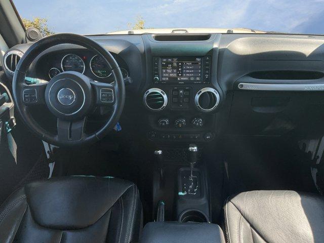 used 2014 Jeep Wrangler Unlimited car, priced at $17,388