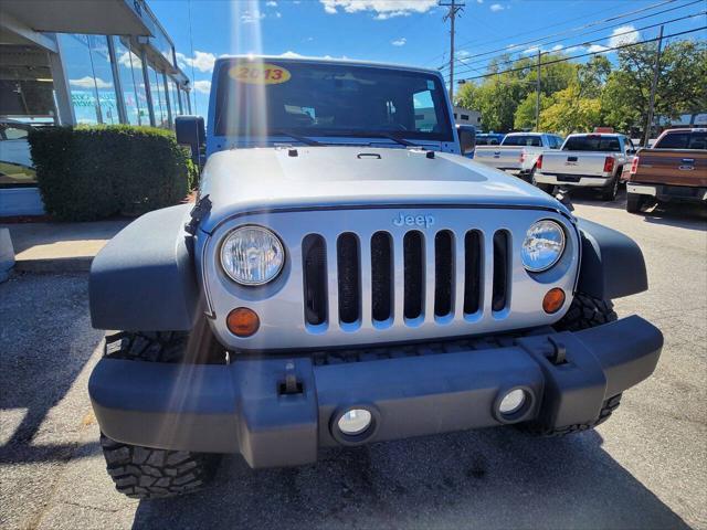 used 2013 Jeep Wrangler Unlimited car, priced at $18,550