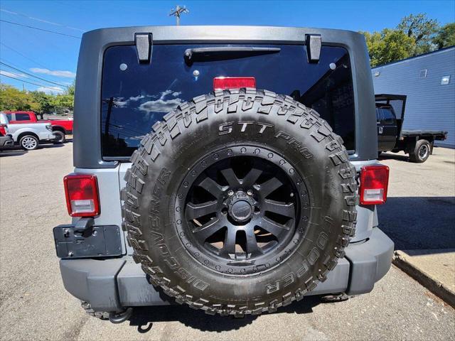 used 2013 Jeep Wrangler Unlimited car, priced at $18,550