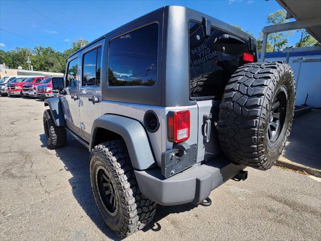 used 2013 Jeep Wrangler Unlimited car, priced at $18,550