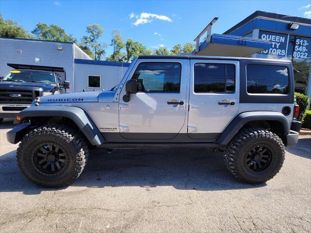 used 2013 Jeep Wrangler Unlimited car, priced at $18,550